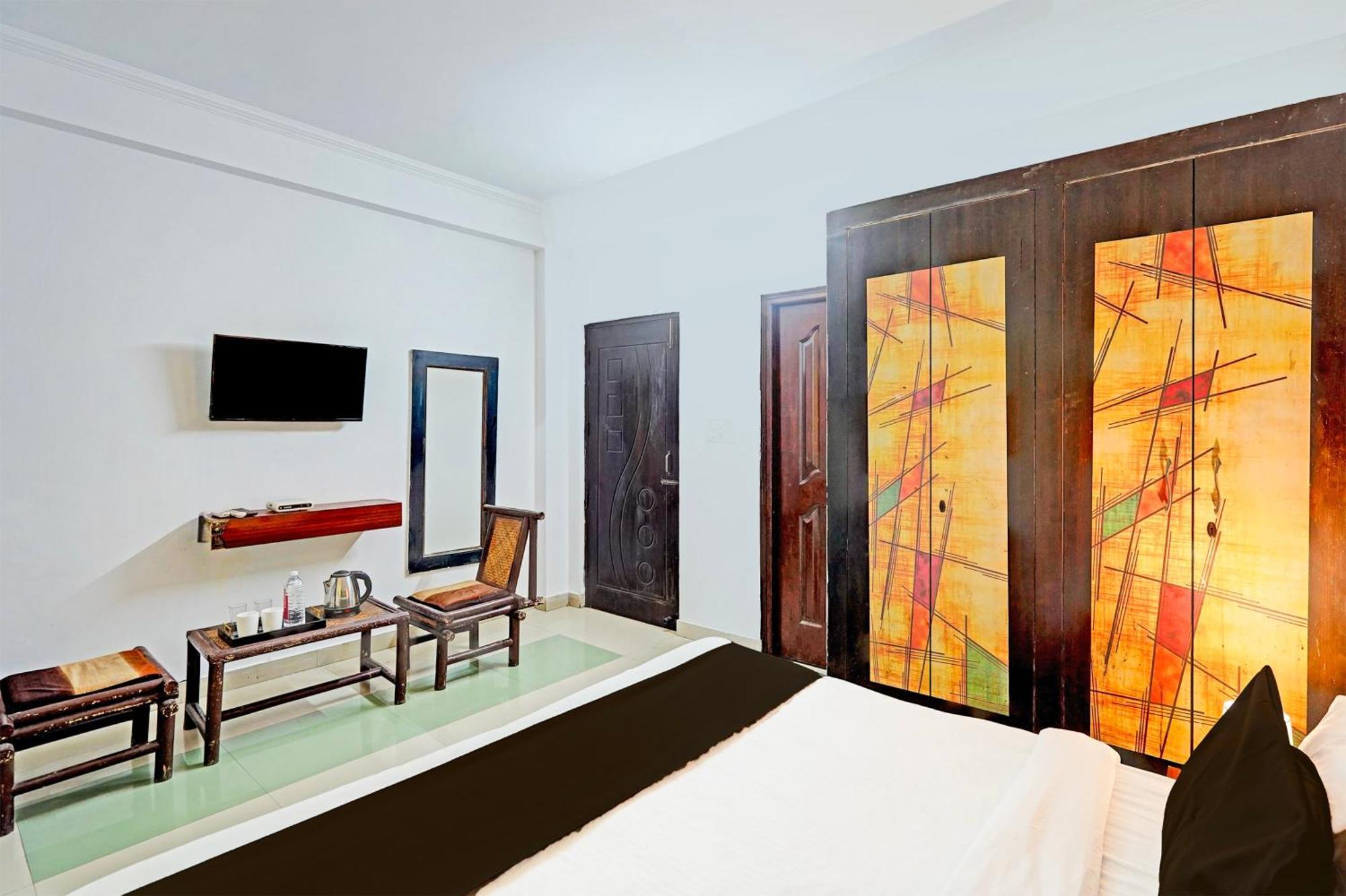 Super Hotel O Palm Dehradun Bagian luar foto