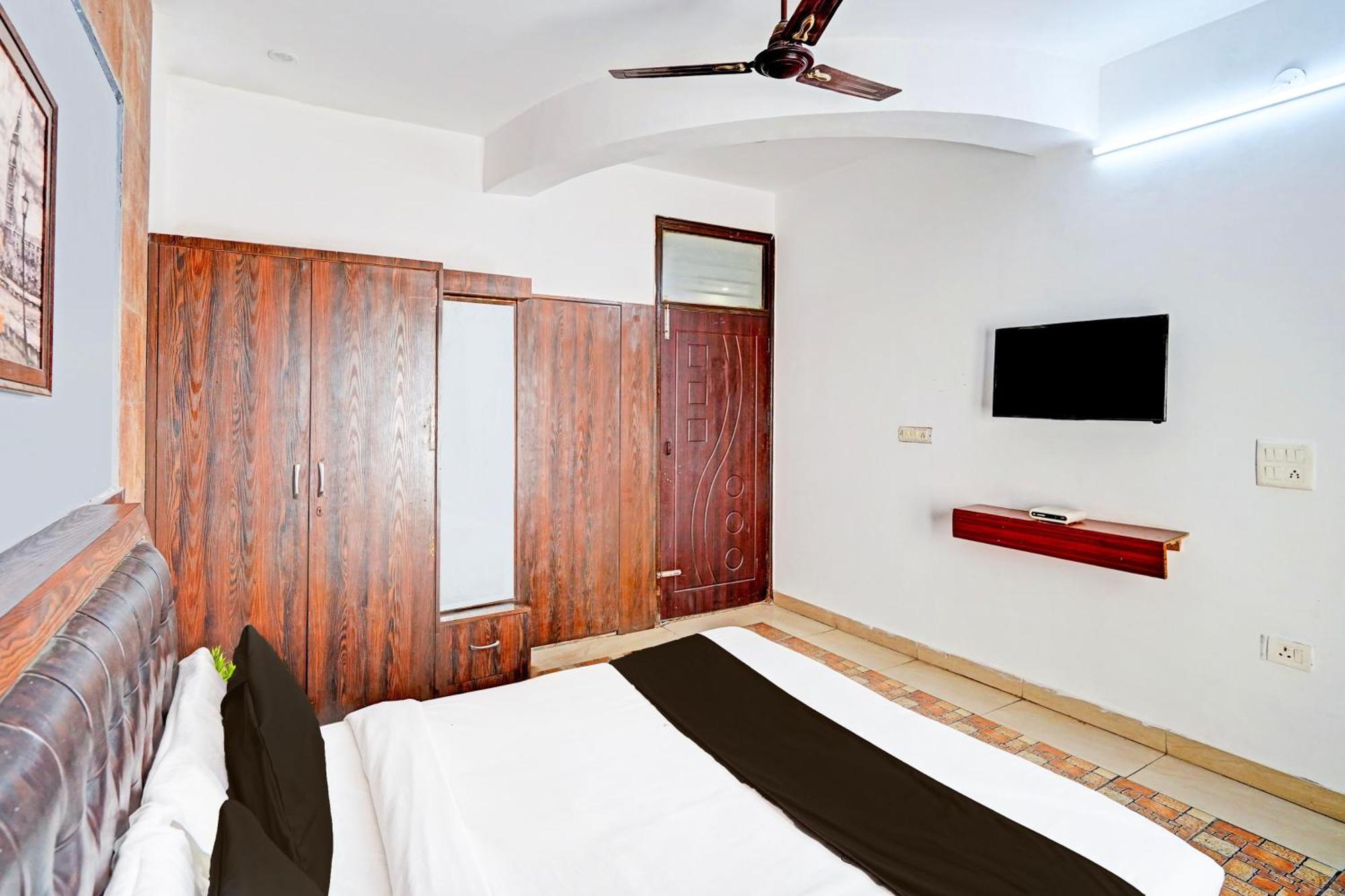 Super Hotel O Palm Dehradun Bagian luar foto