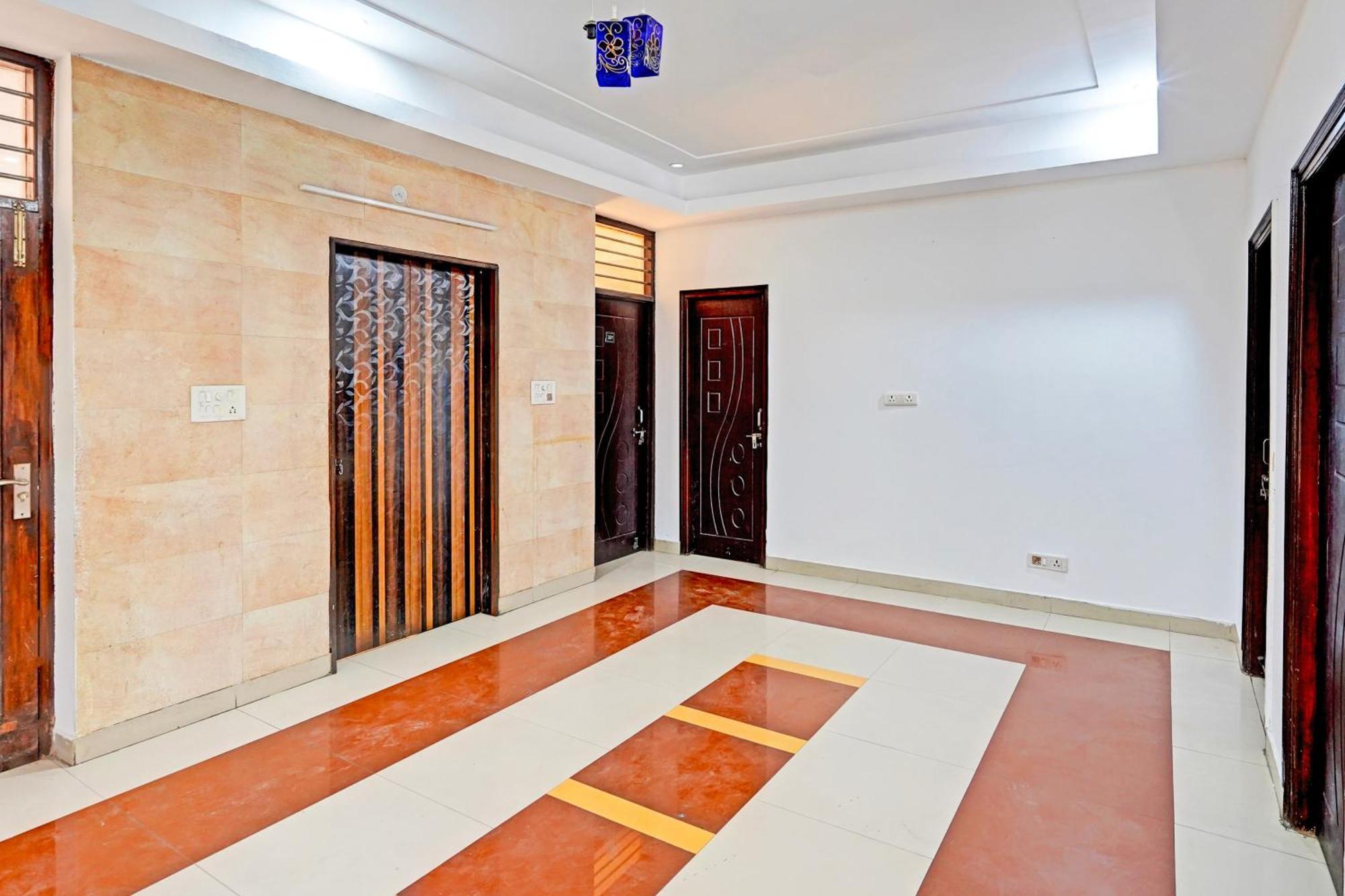 Super Hotel O Palm Dehradun Bagian luar foto